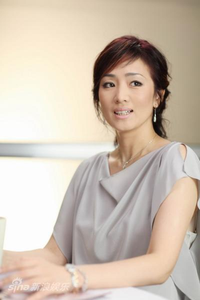 Different looks of Gong Li in 'What Women Want'