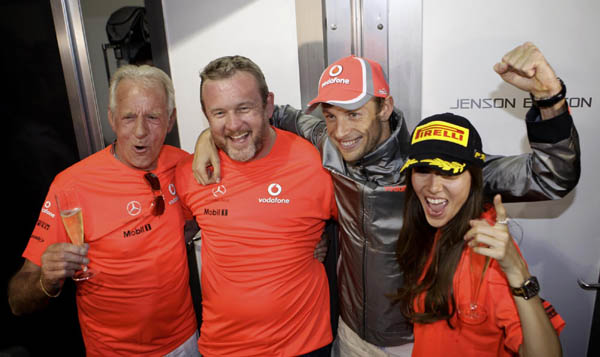 Jessica Michibata cheers for Button