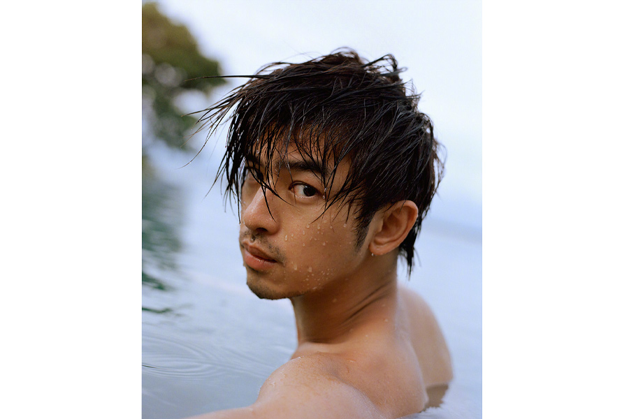 Actor Chen Bolin poses for fashion magazine