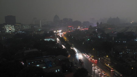 Darkness at noon: Beijing hit by thunderstorm