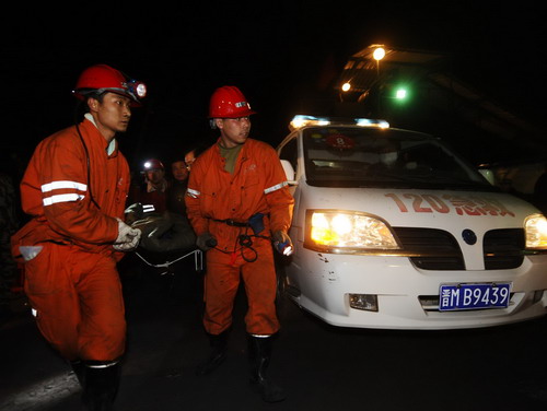 Dozens rescued after week in flooded mine