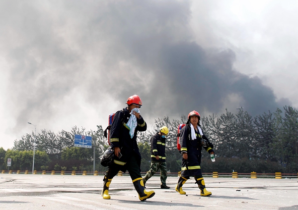 Questions remain as fires put out after Tianjin blasts