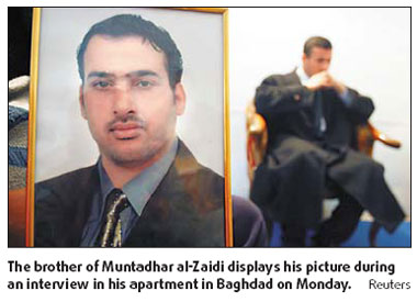 Bush shoe thrower in military custody