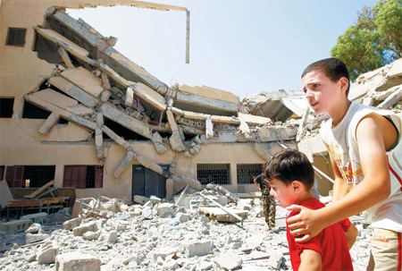 Libyan rebels say overnight NATO strike kills Gadhafi's son