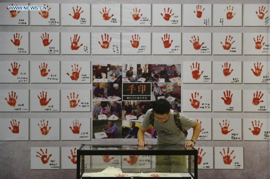 Comfort women survivors' portraits exhibited in Zhejiang