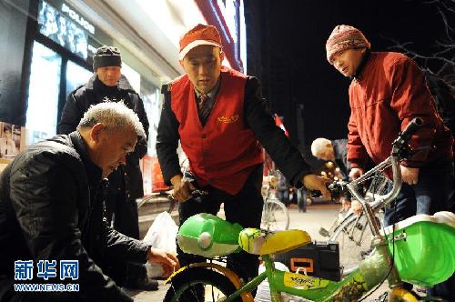 一個義務修車師傅26年的風雨堅守