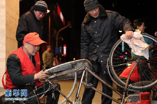 一個義務修車師傅26年的風雨堅守