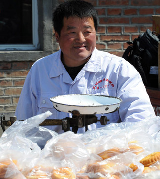 糕點師傅獨臂創(chuàng)造幸福生活