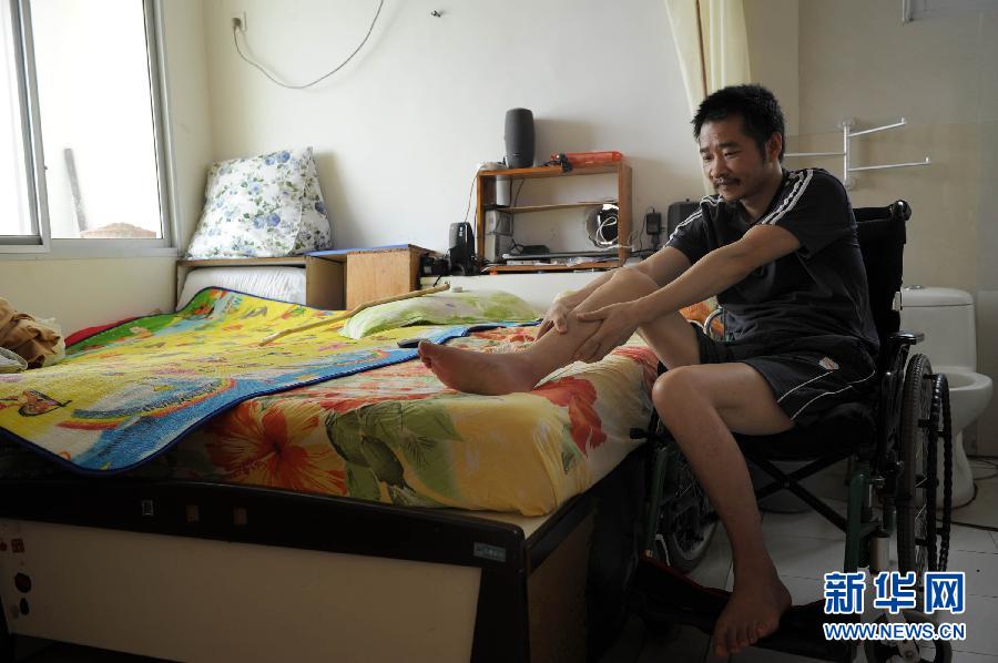 走近用微博掀起“蝴蝶效應(yīng)”的“輪椅哥”周亞武