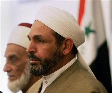 Senior Clerics of the Association of Muslim Scholars in Iraq, Abdul Salam al-Kubaisi, right, and Ibrahim al-Modrris deliver a press conference in Baghdad, Iraq, Wednesday, Oct. 26, 2005.