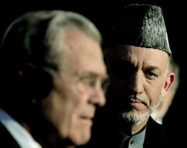 U.S. Secretary of Defense Donald H. Rumsfeld holds a joint news conference with Afghan President Hamid Karzai in Kabul, Afghanistan, Wednesday Dec. 21, 2005.