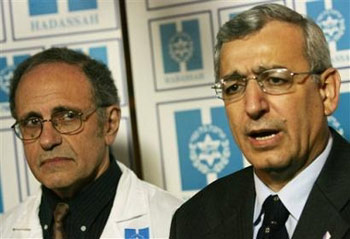 Ariel Sharon started breathing on his own Monday and moved his right arm and leg in response to pain stimulation in what his surgeon called an important development. But it will be days before doctors can determine whether he is lucid or will be able to return to the job.