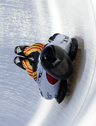 Frank Rommel of Germany speeds down the track during his first run at the FIBT Skeleton World Cup competition at the Olympia Bob Run in Sankt Moritz, Switzerland, January 19, 2006. Jeff Pain of Canada won the competition in a total time of two minutes 18.01 seconds ahead of Switzerland's Gregor Staehli and third placed Frank Rommel of Germany. [Reuters]