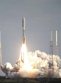 An unmanned NASA spacecraft the size and shape of a concert piano hurtled toward Pluto on Thursday on a 3-billion-mile journey to the solar system's last unexplored planet — a voyage so long that some of the scientists who will be celebrating its arrival are still in junior high.