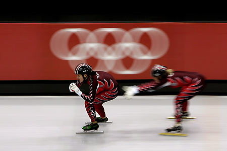 Members of the Canadian women's short track speed skating team train at the Palavela Stadium for the Torino 2006 Winter Olympic Games in Turin, Italy, February 7, 2006. [Reuters]