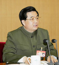 President Hu Jintao delivers a speech during a meeting of the delegation of the Chinese People's Liberation Army (PLA) to the Fourth Session of the Tenth National People's Congress (NPC), in Beijing, capital of China, March 11, 2006.