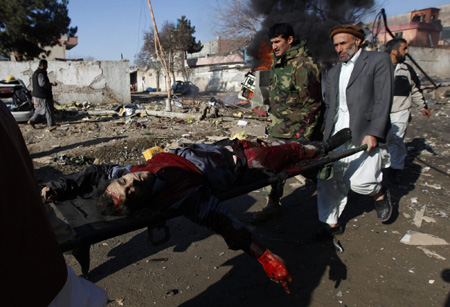 Afghan official: 8 killed in suicide bombing