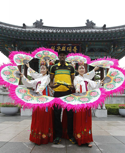 Jamaica poses wearing traditional Hanbok in Daegu