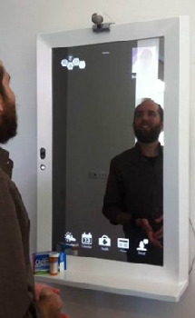 既可讀新聞又可“試”新衣 紐約時報集團推出“魔鏡”