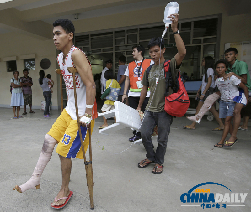 菲律賓災區(qū)眾生相 在災難中仍堅守希望