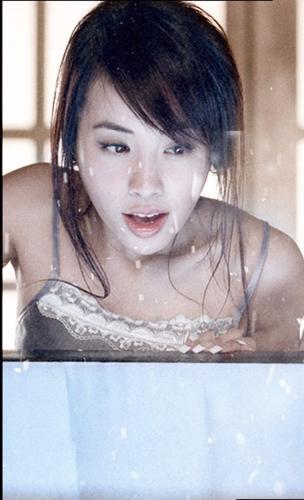 蔡依林八位數重金代言 牛奶沐浴雪中輕舞(圖)