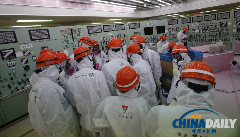 日本大地震三周年 媒體“全副武裝”參觀福島核電站