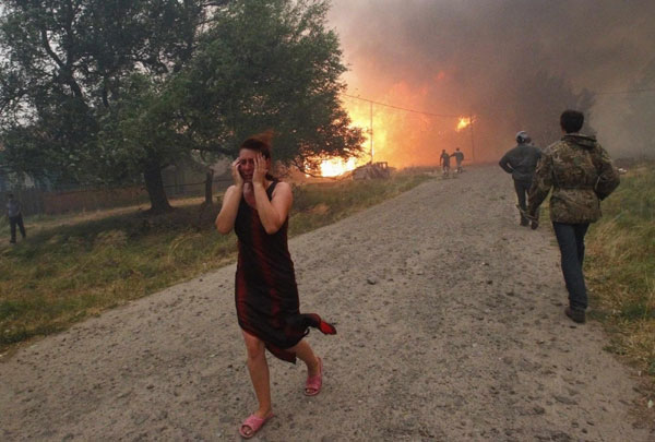 Forest fires spread through Central Russia