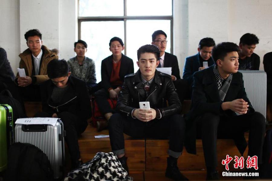 Candidates taking art exams