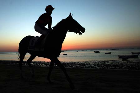 Race along the beach in Spain