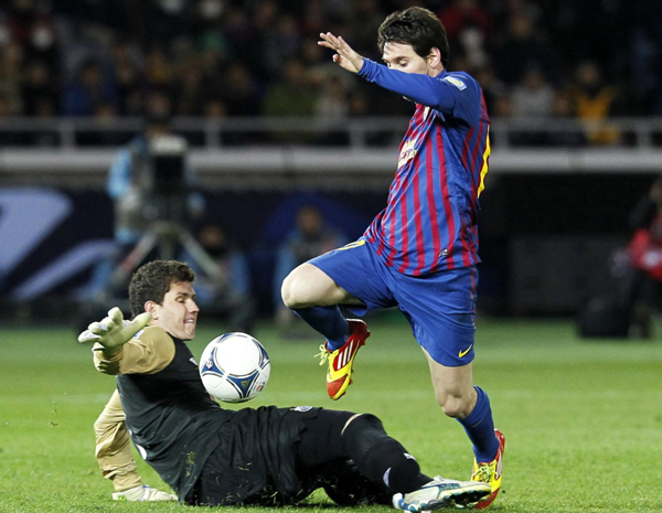 Lionel Messi scored two wonder goals as European champions Barcelona ripped apart Brazil's Santos 4-0 to win their second Club World Cup in swashbuckling style on Sunday. 'Invincible' Barca crush Santos to win Club World Cup