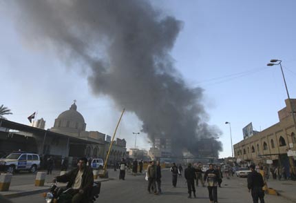 Car bombs blast Baghdad marketplace