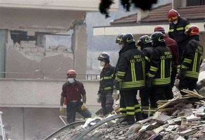 Italy rocked by strong aftershocks; woman rescued