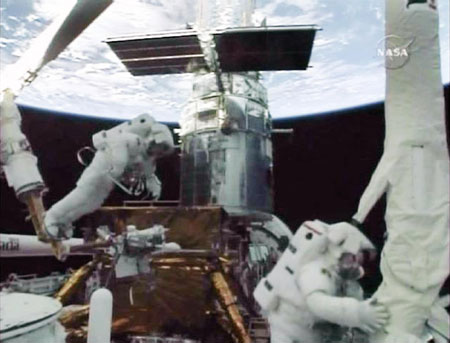 Spacewalkers pull off toughest Hubble repairs yet