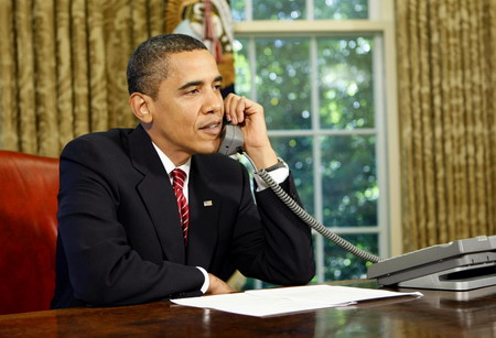 Storms keep space shuttle up extra day