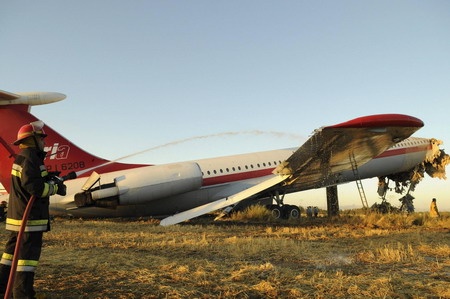 Plane hits wall at Iranian airport, killing 17