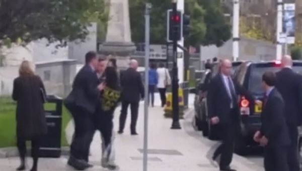 British PM Cameron is confronted in London