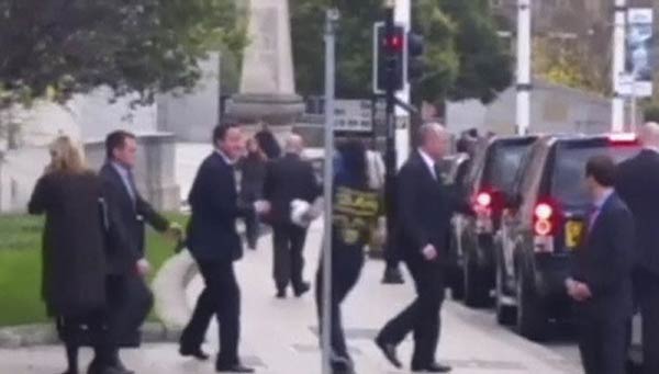 British PM Cameron is confronted in London