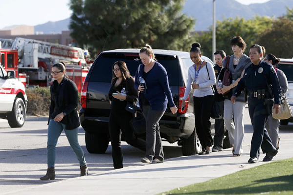 Shooting rampage at California social services agency leaves 14 dead, 17 wounded